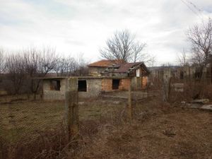 Rural property consisting of an uncompleted house,garage and a plot of land