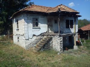 Rural property consisting of two houses,barn and big plot of land located near the center of a big village 10 km away from the town of Vratza,Bulgaria