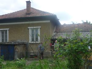 Old country house with big plot of land located in a village