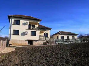 Big house with annex, land & views in a village near river