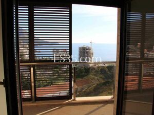 Sea view apartment in complex with a swimming pool in Becici
