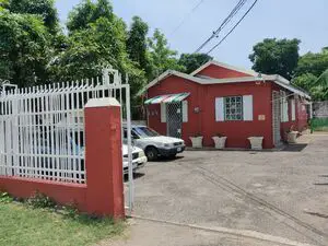 Multi-Function Building & Land in Kingston (Cash Sale Only!)
