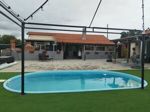 Two renovated houses with pool and large yard for sale near 