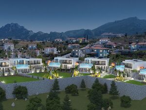 Elegant 4-bed villas with gym, hobby room, and sea views.