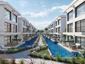 Split-level 1-bed duplex with terrace and open layout.