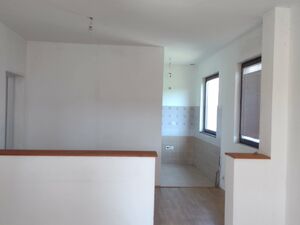 House with business premisses next to the spa