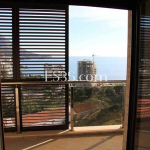 Sea view apartment in complex with a swimming pool in Becici