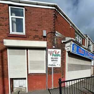 House with Two Flat and One Commercial Store