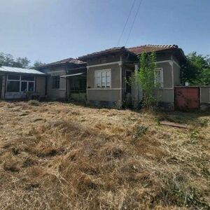 Solid brick house with two entrances with its own yard 