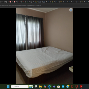 A SECTIONAL TITLE UNIT LOCATED A WALKING MILE FROM THE BEACH