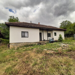 Ready for living country house with plot of land in village