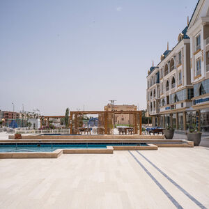 68m apartment with double view  the main street and garden