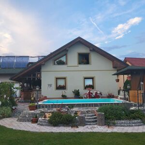 House in the middle of a green valley