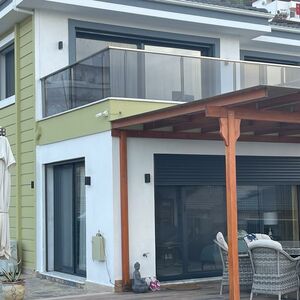 Designer villa with mountain location, sea view, and pool 