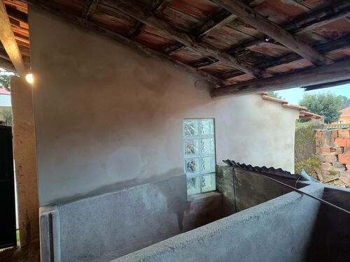 Outside small outbuilding