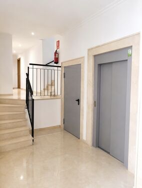 Lift and communal landing