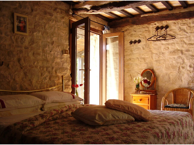 Bedroom with wood burner