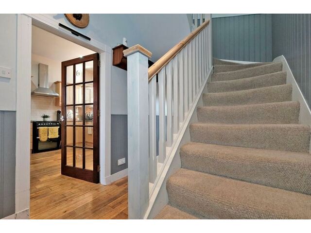 Stairs/backdoor hallway 