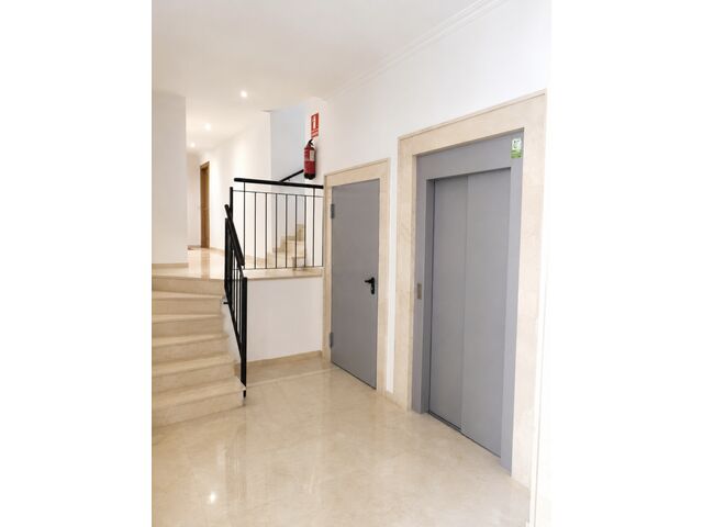 Lift and communal landing